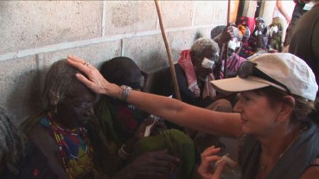 One of the patients with a medical volunteer